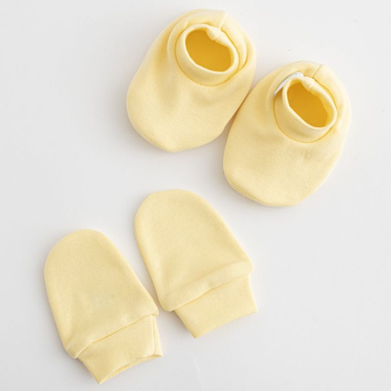 Kojenecký bavlněný set-capáčky a rukavičky New Baby Casually dressed žlutá 0-6m Žlutá